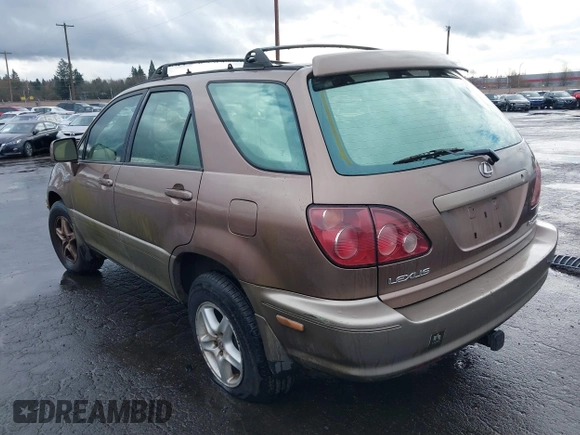 1999 Lexus RX 300 Luxury SUV with VIN JT6HF10U5X0061520, listed as a IAAI auction lot 41612890 with 254,864 mi miles. Bid and sale history available at carsss.com. Image 3.
