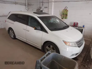 2011 Honda Odyssey Touring с VIN 5FNRL5H9XBB057468, выставлен на аукционе IAAI как лот 41405465 с пробегом Не указан миль и . История ставок и продаж доступна на DreamBid. Изображение 1.