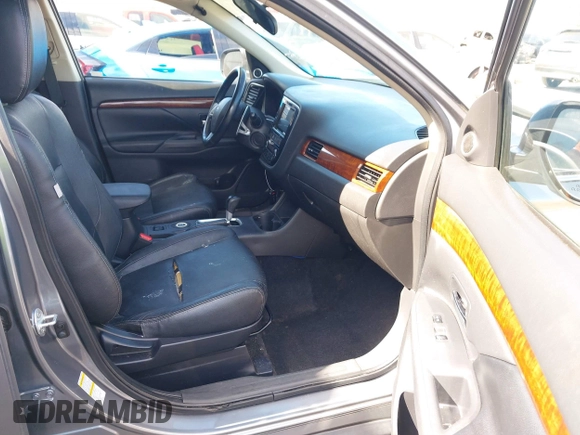 2015 Mitsubishi Outlander GT with VIN JA4JZ4AX1FZ005879, listed as a IAAI auction lot 41701299 with 212,805 mi miles and . Bid and sale history available at DreamBid. Image 5.