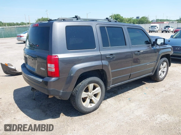 2014 Jeep Patriot Latitude with VIN 1C4NJRFB4ED799037, listed as a IAAI auction lot 42458807 with 105,936 mi miles and . Bid and sale history available at DreamBid. Image 4.