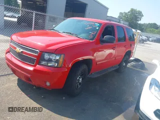2013 Chevrolet Tahoe Commercial with VIN 1GNSK2E02DR167962, listed as a IAAI auction lot 42554839 with 158,634 mi miles and . Bid and sale history available at DreamBid. Image 2.
