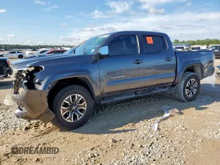 2021 Toyota Tacoma SR5 with VIN 5TFAZ5CN4MX096887, listed as a Copart auction lot 58846385 with 58,863 mi miles and Salvage title. Bid and sale history available at DreamBid. Image 1.