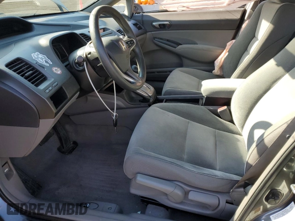 2009 Honda Civic LX z VIN 2HGFA16519H519732, wystawiony jako Copart lot #54018665 z przebiegiem 136 589 mil mil oraz Szkoda całkowita • Salvage title. Historia ofert i sprzedaży dostępna na DreamBid. Obrazek 7.