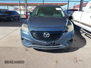 2014 Mazda CX-9 Sport with VIN JM3TB3BA5E0427753, listed as a IAAI auction lot 41679267 with 135,993 mi miles and . Bid and sale history available at DreamBid. Image 6.
