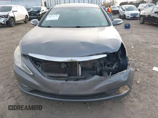 2014 Hyundai Sonata Limited with VIN 5NPEC4AB9EH897799, listed as a IAAI auction lot 40771774 with 221,000 mi miles and . Bid and sale history available at DreamBid. Image 6.