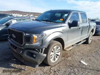 2018 Ford F-150 XL with VIN 1FTEW1EP2JFB56443, listed as a IAAI auction lot 41064561 with 105,215 mi miles. Bid and sale history available at carsss.com. Image 2.