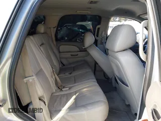 2010 GMC Yukon SLT with VIN 1GKUCCE00AR255901, listed as a IAAI auction lot 42149960 with 196,014 mi miles. Bid and sale history available at carsss.com. Image 8.