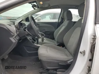2015 Chevrolet Sonic LS with VIN 1G1JA5SH4F4165108, listed as a Copart auction lot 57299985 with 117,669 mi miles and Clean title. Bid and sale history available at DreamBid. Image 7.