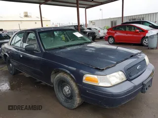 2001 Ford Crown Victoria Police Police Interceptor with VIN 2FAFP71WX1X127347, listed as a IAAI auction lot 41134745 with 161,180 mi miles. Bid and sale history available at carsss.com. Image 13.