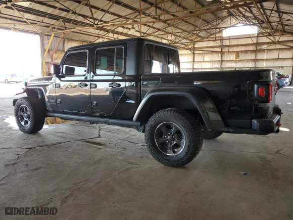 2023 Jeep Gladiator Rubicon with VIN 1C6JJTBG4PL582956, listed as a Copart auction lot 45237665 with 22,797 mi miles and Salvage Title. Bid and sale history available at carsss.com. Image 2.