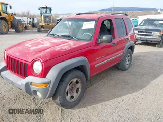 2002 Jeep Liberty Sport with VIN 1J4GL48K82W279730, listed as a IAAI auction lot 40903674 with 133,082 mi miles. Bid and sale history available at carsss.com. Image 2.