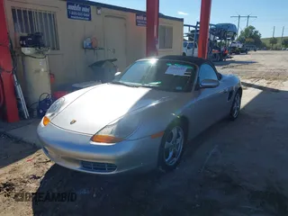2002 Porsche Boxster z VIN WP0CA29882U622162, wystawiony jako IAAI lot #41654257 z przebiegiem 44 608 mil mil oraz . Historia ofert i sprzedaży dostępna na DreamBid. Obrazek 6.