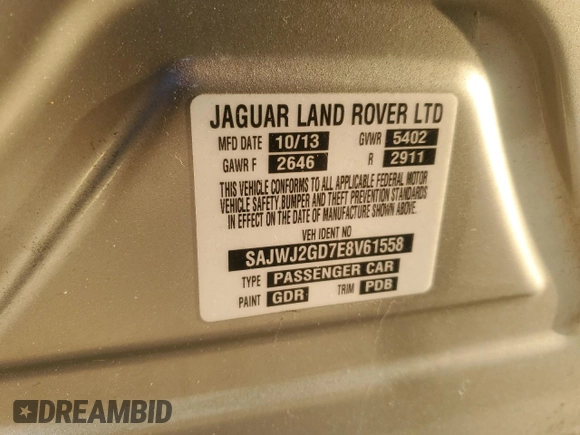 2014 Jaguar XJ Portfolio with VIN SAJWJ2GD7E8V61558, listed as a Copart auction lot 66850034 with 130,984 mi miles and Salvage title. Bid and sale history available at DreamBid. Image 14.