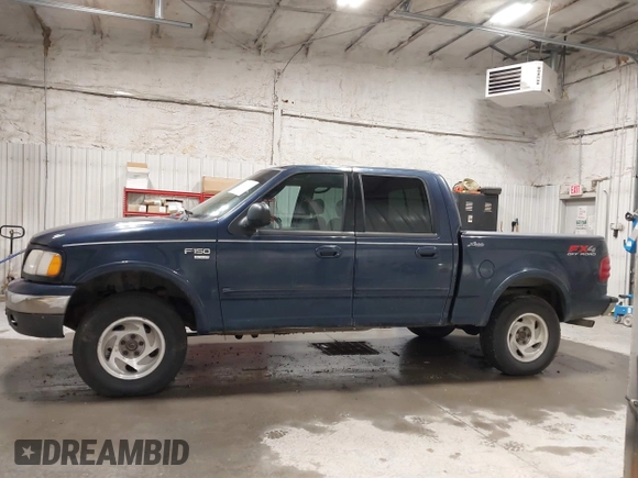 2003 Ford F-150 XLT z VIN 1FTRW08L73KC11631, wystawiony jako IAAI lot #42673130 z przebiegiem 188 945 mil mil oraz . Historia ofert i sprzedaży dostępna na DreamBid. Obrazek 14.