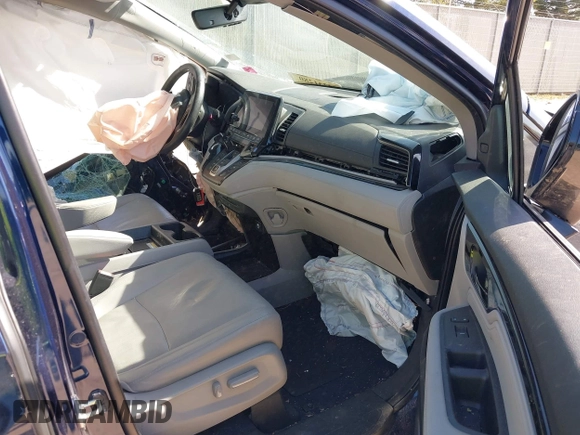 2020 Honda Odyssey Elite with VIN 5FNRL6H95LB052590, listed as a IAAI auction lot 42231280 with 65,165 mi miles and . Bid and sale history available at DreamBid. Image 5.