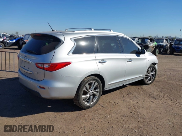 2015 Infiniti QX60 with VIN 5N1AL0MN7FC553099, listed as a IAAI auction lot 42094321 with 100,023 mi miles and . Bid and sale history available at DreamBid. Image 4.