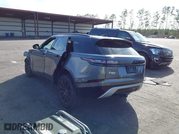 2019 Land Rover Range Rover Velar R-Dynamic SE z VIN SALYL2EXXKA210087, wystawiony jako IAAI lot #41801144 z przebiegiem 52 758 mil mil oraz . Historia ofert i sprzedaży dostępna na DreamBid. Obrazek 3.