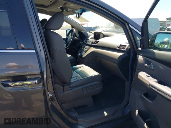 2013 Honda Odyssey Touring with VIN 5FNRL5H95DB045666, listed as a IAAI auction lot 42117219 with 50,715 mi miles and . Bid and sale history available at carsss.com. Image 5.