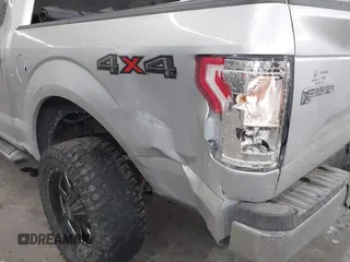 2015 Ford F-150 XLT with VIN 1FTEW1E89FFA44710, listed as a IAAI auction lot 41521584 with 158,297 mi miles. Bid and sale history available at carsss.com. Image 6.