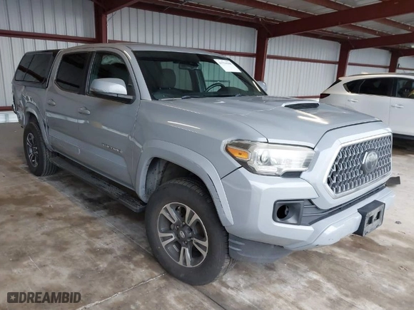 2018 Toyota Tacoma SR with VIN 3TMCZ5AN9JM177736, listed as a IAAI auction lot 41534308 with 250,608 mi miles. Bid and sale history available at carsss.com. Image 1.