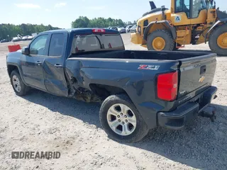2017 Chevrolet Silverado 1500 LT with VIN 1GCVKREC9HZ180710, listed as a IAAI auction lot 40204758 with 255,247 mi miles and . Bid and sale history available at DreamBid. Image 3.