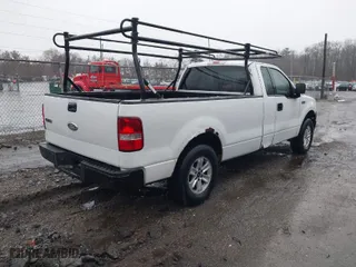 2007 Ford F-150 XL with VIN 1FTRF12297NA61726, listed as a IAAI auction lot 41737981 with 274,398 mi miles. Bid and sale history available at carsss.com. Image 4.
