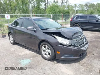2014 Chevrolet Cruze 1LT z VIN 1G1PC5SBXE7178264, wystawiony jako IAAI lot #42387875 z przebiegiem 125 437 mil mil oraz . Historia ofert i sprzedaży dostępna na DreamBid. Obrazek 1.