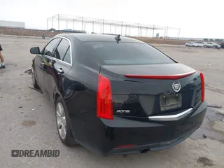 2014 Cadillac ATS Standard RWD with VIN 1G6AA5RA1E0108650, listed as a IAAI auction lot 42268622 with 99,703 mi miles and . Bid and sale history available at DreamBid. Image 3.