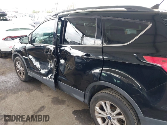 2018 Ford Escape SEL with VIN 1FMCU0HD6JUA86266, listed as a IAAI auction lot 42031613 with 72,798 mi miles and . Bid and sale history available at carsss.com. Image 17.