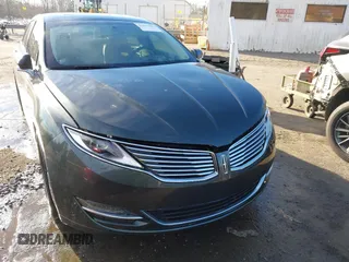 2015 Lincoln MKZ z VIN 3LN6L2J99FR605715, wystawiony jako IAAI lot #41431384 z przebiegiem Nie podano mil oraz . Historia ofert i sprzedaży dostępna na DreamBid. Obrazek 6.