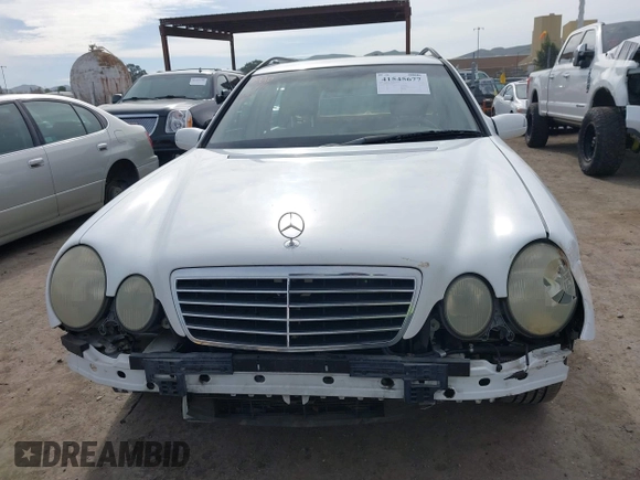 2001 Mercedes-Benz E-Class with VIN WDBJH65J31B364290, listed as a IAAI auction lot 41545677 with 162,040 mi miles. Bid and sale history available at carsss.com. Image 13.