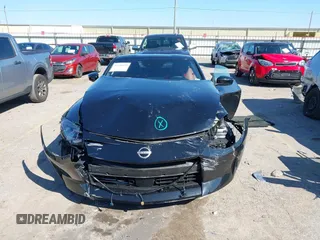 2023 Nissan Z Performance with VIN JN1BZ4BH9PM310761, listed as a IAAI auction lot 41630494 with 6,541 mi miles and . Bid and sale history available at DreamBid. Image 12.