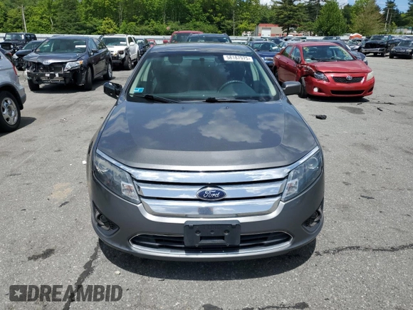 2012 Ford Fusion SE z VIN 3FAHP0HA6CR183815, wystawiony jako Copart lot #58187975 z przebiegiem 118 101 mil mil oraz Szkoda całkowita • Salvage title. Historia ofert i sprzedaży dostępna na DreamBid. Obrazek 5.