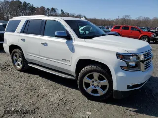 2015 Chevrolet Tahoe LTZ with VIN 1GNSKCKC9FR666040, listed as a Copart auction lot 44431875 with 233,166 mi miles and Salvage Title. Bid and sale history available at carsss.com. Image 4.