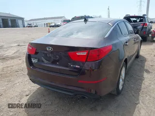 2014 Kia Optima EX z VIN 5XXGN4A77EG338455, wystawiony jako IAAI lot #42071765 z przebiegiem 136 331 mil mil oraz . Historia ofert i sprzedaży dostępna na DreamBid. Obrazek 4.