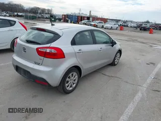 2013 Kia Rio LX with VIN KNADM5A30D6226681, listed as a IAAI auction lot 41657362 with 127,569 mi miles. Bid and sale history available at carsss.com. Image 4.