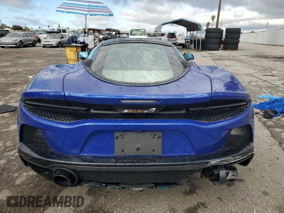 2023 McLaren GT z VIN SBM22GCA9PW003039, wystawiony jako Copart lot #47143765 z przebiegiem 2775 mil mil oraz Szkody całkowita. Historia ofert i sprzedaży dostępna na DreamBid. Obrazek 6.