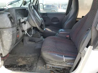1999 Jeep Wrangler Sport with VIN 1J4FY19SXXP464096, listed as a Copart auction lot 61233105 with 167,350 mi miles and Clean title. Bid and sale history available at DreamBid. Image 7.