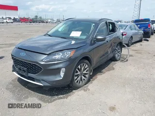 2020 Ford Escape Titanium with VIN 1FMCU9J94LUB19570, listed as a IAAI auction lot 42134031 with 110,248 mi miles and . Bid and sale history available at DreamBid. Image 18.