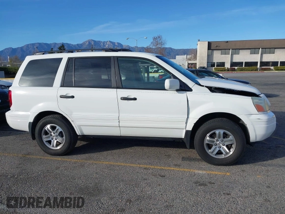 2005 Honda Pilot EX with VIN 5FNYF18475B060655, listed as a IAAI auction lot 41381619 with 142,680 mi miles and . Bid and sale history available at DreamBid. Image 13.