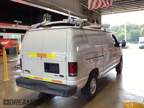 2013 Ford Econoline Cargo Commercial with VIN 1FTNE1EW9DDA61968, listed as a IAAI auction lot 42643038 with 121,719 mi miles and . Bid and sale history available at DreamBid. Image 2.