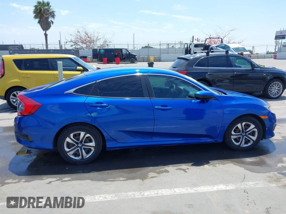 2017 Honda Civic LX z VIN 2HGFC2F56HH516730, wystawiony jako IAAI lot #42130963 z przebiegiem 119 236 mil mil oraz . Historia ofert i sprzedaży dostępna na DreamBid. Obrazek 13.
