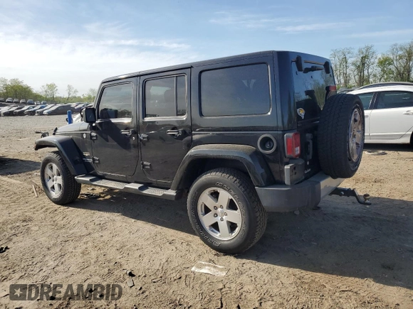 2013 Jeep Wrangler Unlimited Moab with VIN 1C4HJWEG9DL667663, listed as a Copart auction lot 53716105 with 184,885 mi miles and Salvage title. Bid and sale history available at DreamBid. Image 2.