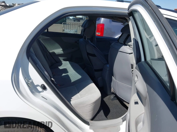 2009 Toyota Corolla with VIN JTDBL40E699058755, listed as a IAAI auction lot 42564996 with 211,526 mi miles and . Bid and sale history available at DreamBid. Image 8.