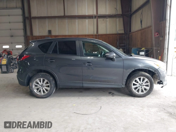 2015 Mazda CX-5 Touring with VIN JM3KE4CY6F0510002, listed as a IAAI auction lot 42045284 with 88,949 mi miles and . Bid and sale history available at DreamBid. Image 14.