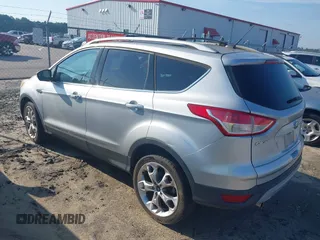 2013 Ford Escape Titanium with VIN 1FMCU0J94DUB58785, listed as a IAAI auction lot 42631897 with 163,037 mi miles and . Bid and sale history available at DreamBid. Image 3.