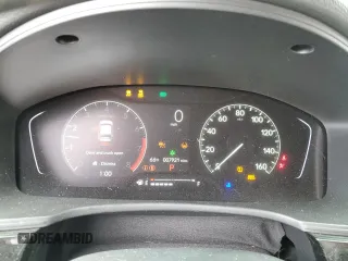 2023 Honda Civic EX z VIN 2HGFE1F72PH312995, wystawiony jako Copart lot #57284305 z przebiegiem 7 921 mil mil oraz Szkoda całkowita • Salvage title. Historia ofert i sprzedaży dostępna na DreamBid. Obrazek 9.