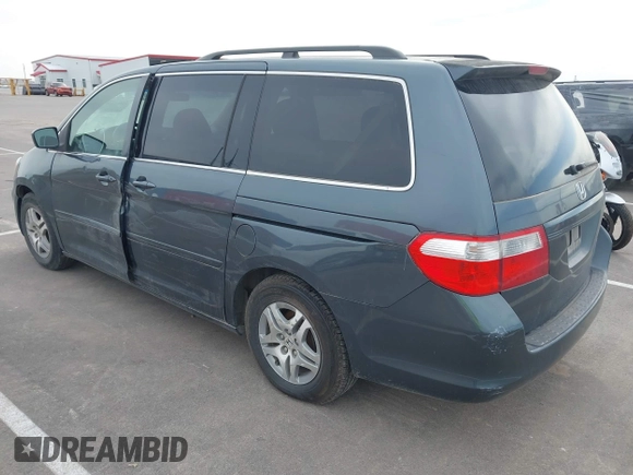 2005 Honda Odyssey EX with VIN 5FNRL38465B108123, listed as a IAAI auction lot 41961270 with 169,948 mi miles. Bid and sale history available at carsss.com. Image 3.