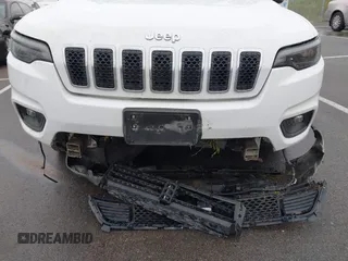 2021 Jeep Cherokee Latitude Lux z VIN 1C4PJMMX4MD221786, wystawiony jako IAAI lot #42432825 z przebiegiem 54 297 mil mil oraz . Historia ofert i sprzedaży dostępna na DreamBid. Obrazek 6.