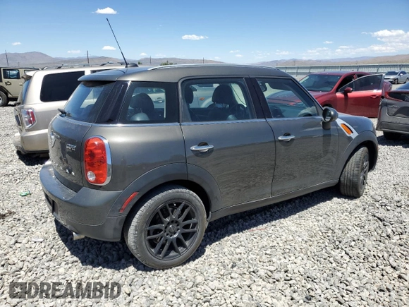 2014 MINI Countryman with VIN WMWZB3C56EWR38919, listed as a Copart auction lot 61385865 with 127,368 mi miles and Salvage title. Bid and sale history available at DreamBid. Image 3.